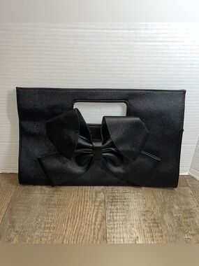 Deb & Dave black leather bow clutch handbag